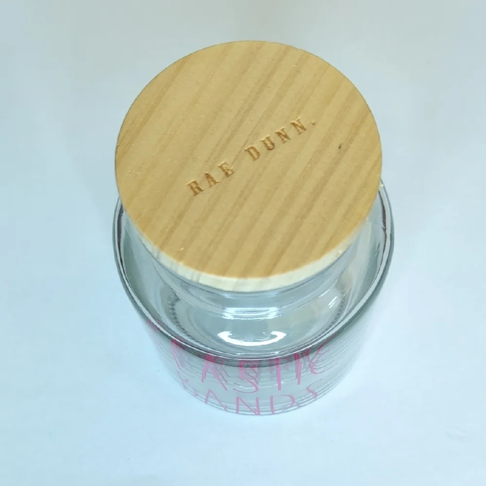 NEW Rae Dunn Clear Elastic Bands Jar with Tan Wooden Lid and Lilac Lettering